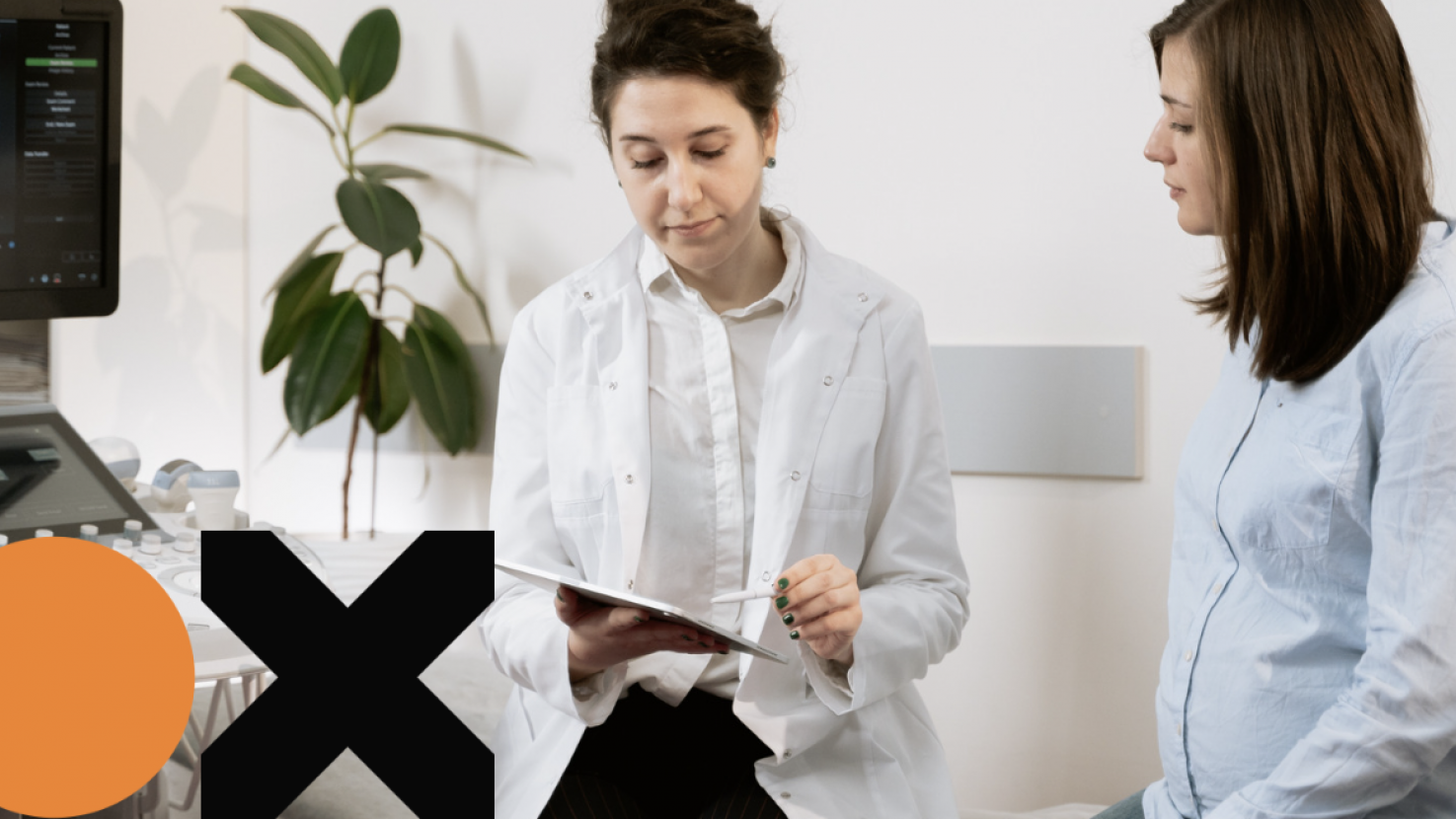 A doctor reviewing data with her patient