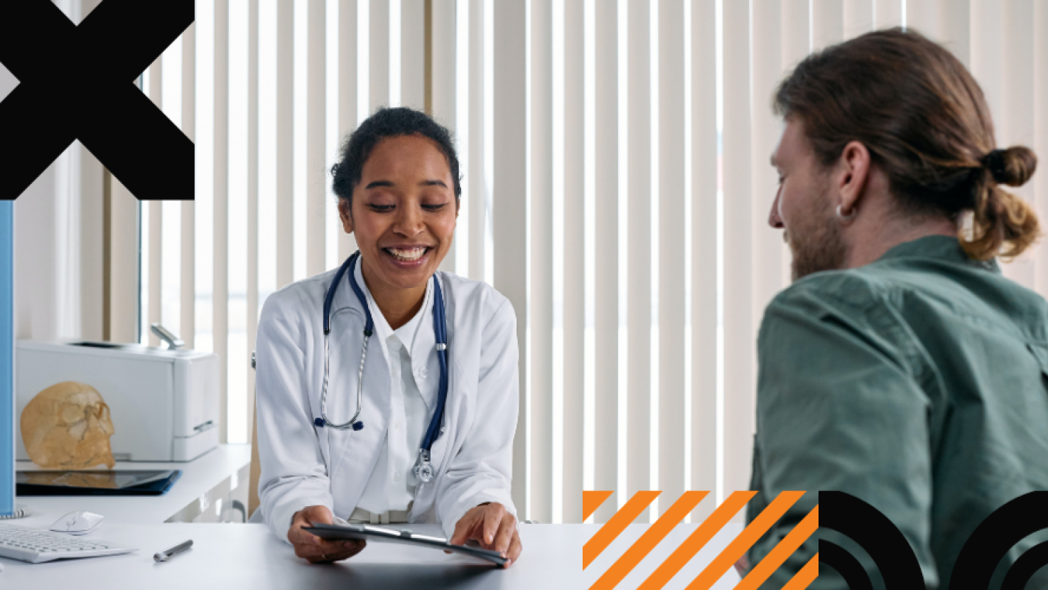 A doctor reviewing data with her patient