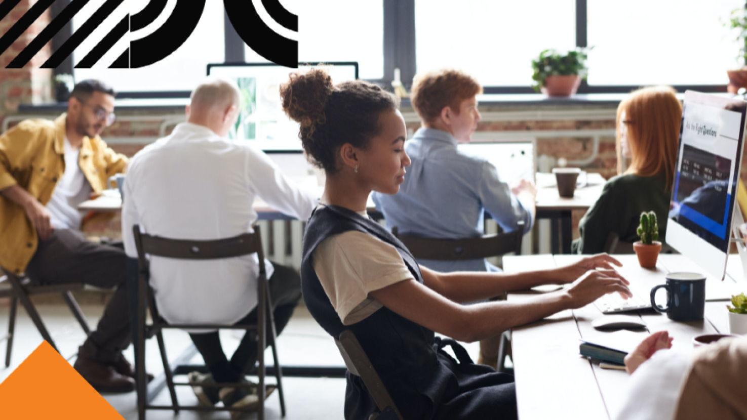 team members working at their desks